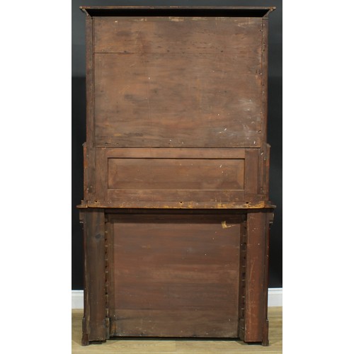 898 - A 19th century flame mahogany library bookcase side cabinet, outswept cornice above three waterfall ... 