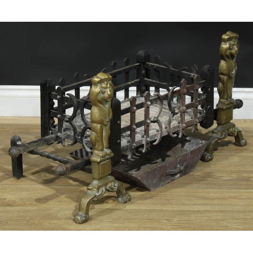 1053 - A country house cast iron and brass fire basket, the andirons as standing lions, the grate 46cm x 29... 