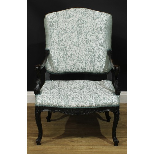 1401 - A pair of Louis XV Revival ebonised fauteuils, each with stuffed-over upholstery, shaped arms carved... 