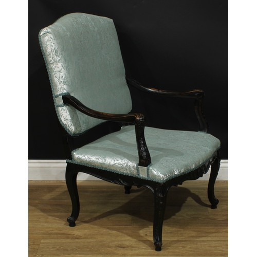 1401 - A pair of Louis XV Revival ebonised fauteuils, each with stuffed-over upholstery, shaped arms carved... 