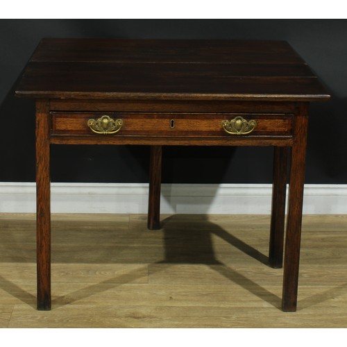 1170 - A George III oak tea table, hinged rectangular top above a long mahogany crossbanded drawer, interna... 