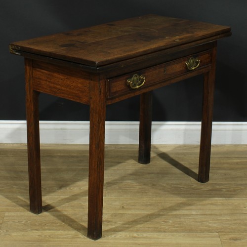 1170 - A George III oak tea table, hinged rectangular top above a long mahogany crossbanded drawer, interna... 