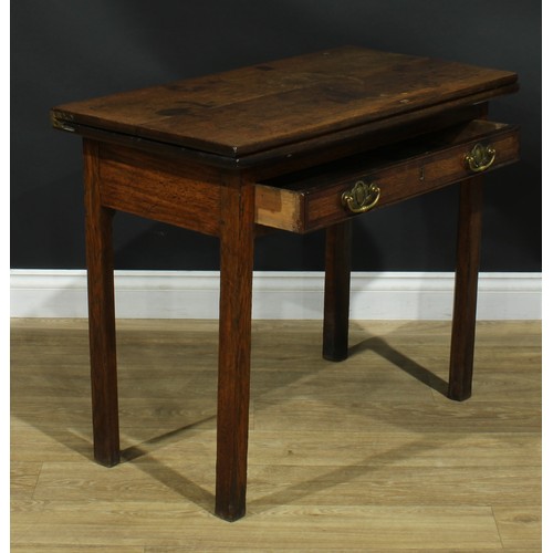 1170 - A George III oak tea table, hinged rectangular top above a long mahogany crossbanded drawer, interna... 