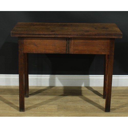 1170 - A George III oak tea table, hinged rectangular top above a long mahogany crossbanded drawer, interna... 