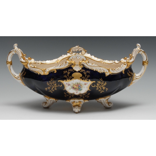 509 - A Coalport boat-shaped vase,  painted with fanciful birds within a gilt cartouche, the verso with fl... 