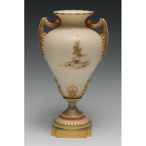 427 - A Royal Worcester pedestal vase, decorated in green adn gilt with trees in a landscape, two acanthus... 