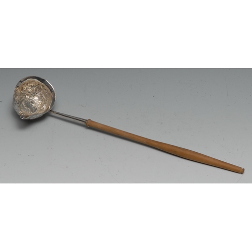 135 - A George III silver toddy ladle, 31cm long, apparently unmarked, the bowl set with a Queen Anne shil... 