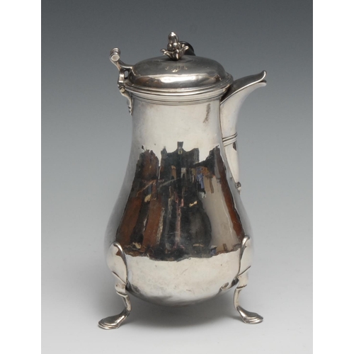 250 - An 18th century French silver side-handled coffee pot, hinged domed cover with bud finial, turned ha... 