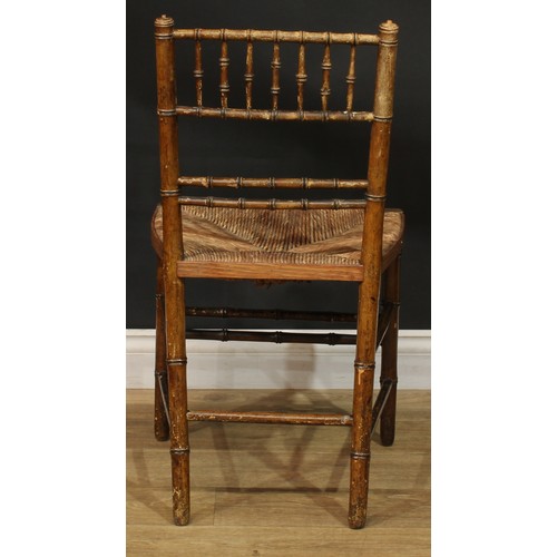 1129 - A set of three 19th century faux-bamboo side chairs, rush seats, 84.5cm high, 45cm wide, the seat 34... 