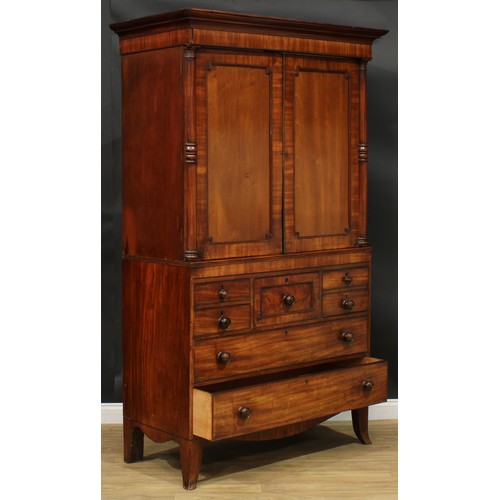 1415 - A Post-Regency mahogany hanging press cupboard, formerly a linen press, possibly Scottish, outswept ... 