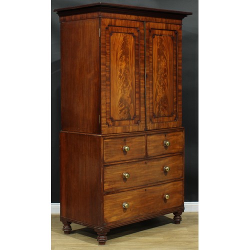 1272 - A George IV mahogany hanging press cupboard, formerly a linen press, moulded cornice above a pair of... 