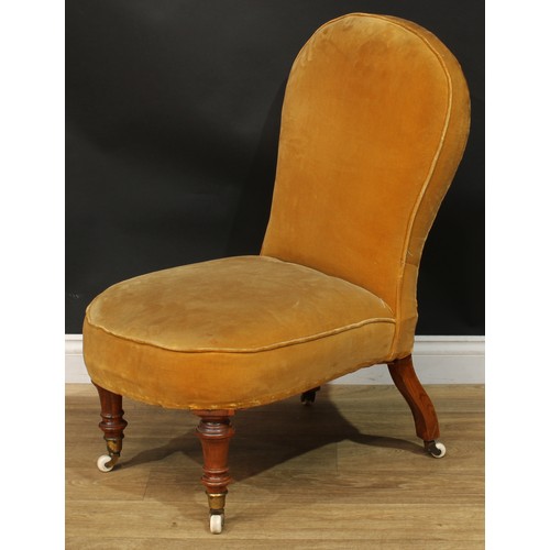 1467 - A Victorian drawing room chair, stuffed-over upholstery, turned forelegs, ceramic casters, 92.5cm hi... 