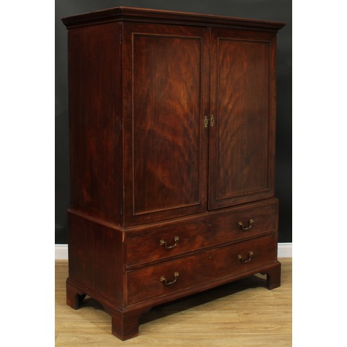 1219 - A George III mahogany hanging press cupboard, formerly a linen press, moulded cornice above a pair o... 