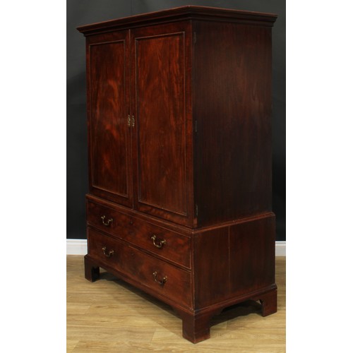 1219 - A George III mahogany hanging press cupboard, formerly a linen press, moulded cornice above a pair o... 