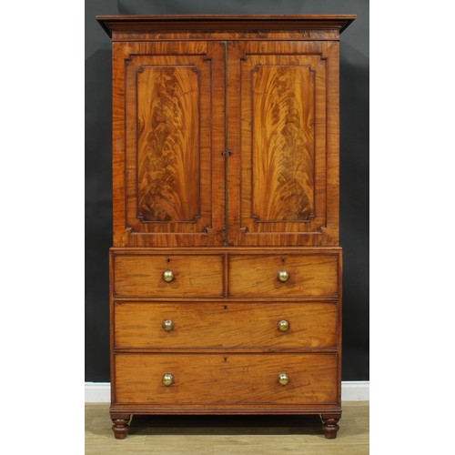 1273 - A George IV mahogany hanging press cupboard, formerly a linen press, moulded cornice above a pair of... 