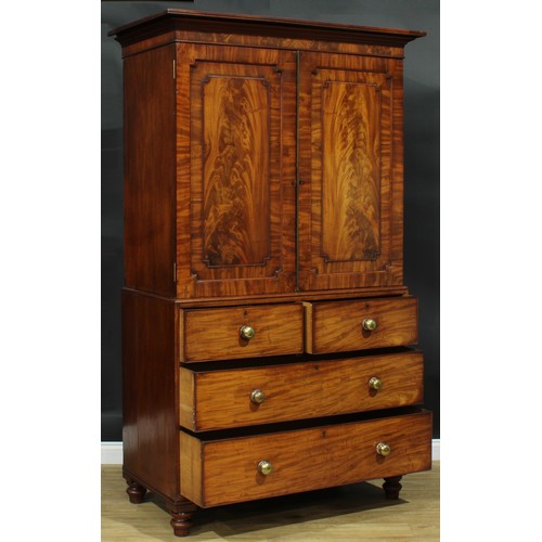 1273 - A George IV mahogany hanging press cupboard, formerly a linen press, moulded cornice above a pair of... 