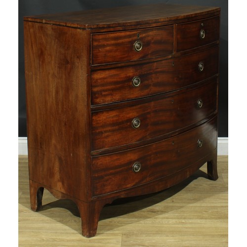 1421 - A Regency mahogany bowfront caddy-top chest, of two short and three long graduated cockbeaded drawer... 