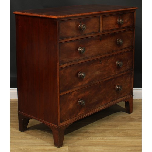 1108 - A George III mahogany chest, of two short and three long graduated cockbeaded drawers, bracket feet,... 