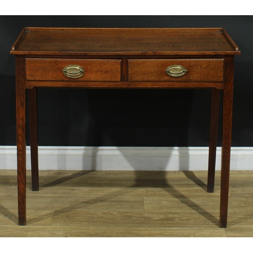 1168 - A George III oak side table, possibly Scottish, rectangular top with shallow three-quarter gallery a... 