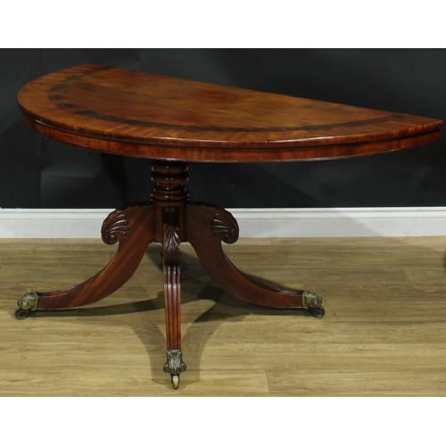 1397 - A pair of George/William IV mahogany demilune side tables, formerly the end sections of a dining tab... 