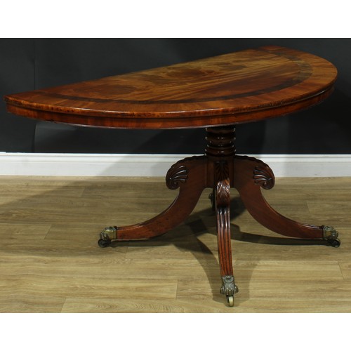 1397 - A pair of George/William IV mahogany demilune side tables, formerly the end sections of a dining tab... 