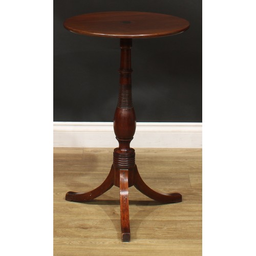 940 - A 19th century mahogany tripod wine table, circular top inlaid with a six-pointed star, ring-turned ... 