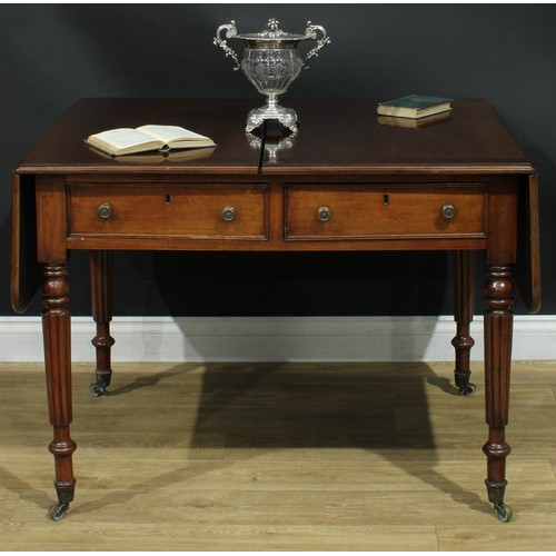 1274 - A George IV mahogany sofa table, rosewood crossbanded top with fall leaves above a pair of frieze dr... 