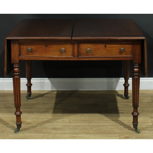 1274 - A George IV mahogany sofa table, rosewood crossbanded top with fall leaves above a pair of frieze dr... 