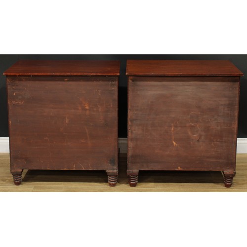 1364 - A near pair of 19th century mahogany commodes, each as a chest of four long drawers, turned feet, 75... 