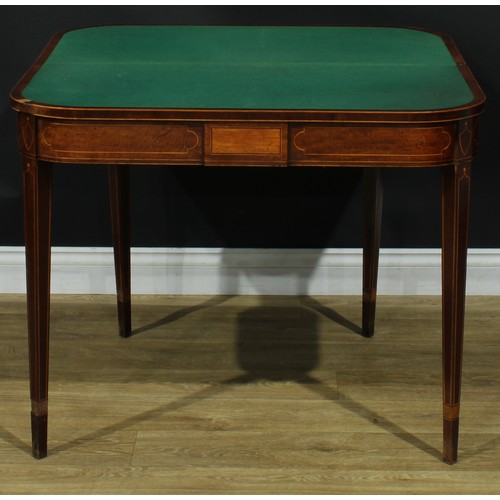 1394 - A pair of George III mahogany D-shaped card tables, each with a hinged crossbanded top enclosing a b... 