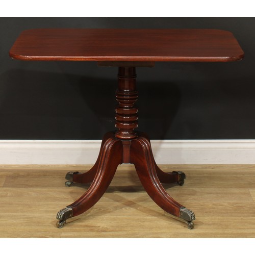 1404 - A pair of Regency mahogany occasional tables, each with a rounded rectangular top, turned column, sa... 