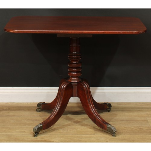 1404 - A pair of Regency mahogany occasional tables, each with a rounded rectangular top, turned column, sa... 