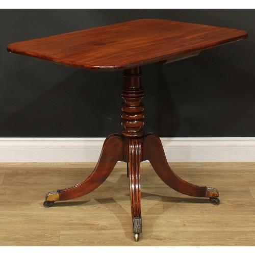 1404 - A pair of Regency mahogany occasional tables, each with a rounded rectangular top, turned column, sa... 