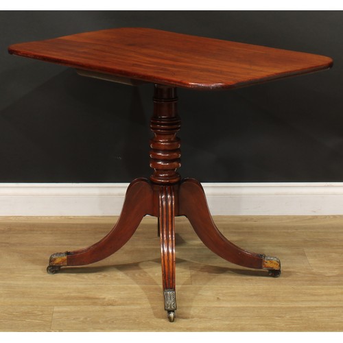 1404 - A pair of Regency mahogany occasional tables, each with a rounded rectangular top, turned column, sa... 