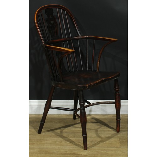 1122 - A set of four 19th century Windsor elbow chairs, each with a low hoop back, shaped and pierced splat... 