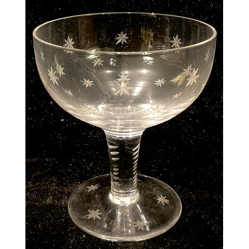 549 - A set of Edwardian star cut glass champagne slippers and port glasses (approximately 40)