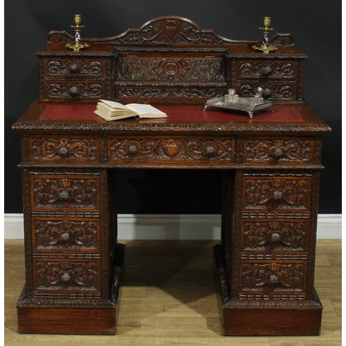 1339 - A late Victorian oak twin pedestal desk, by Edwards & Roberts (fl.1845-1899), stamped, shaped supers... 