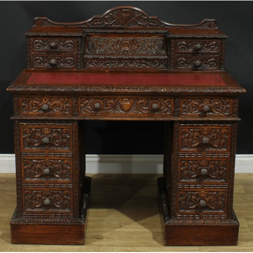 1339 - A late Victorian oak twin pedestal desk, by Edwards & Roberts (fl.1845-1899), stamped, shaped supers... 