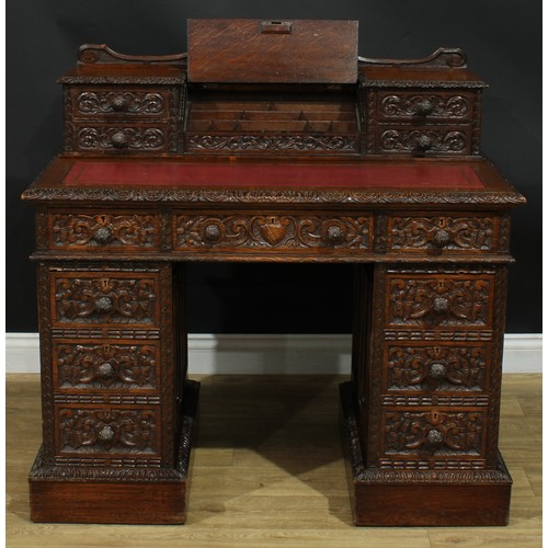 1339 - A late Victorian oak twin pedestal desk, by Edwards & Roberts (fl.1845-1899), stamped, shaped supers... 