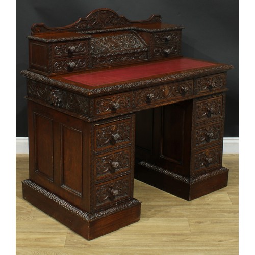 1339 - A late Victorian oak twin pedestal desk, by Edwards & Roberts (fl.1845-1899), stamped, shaped supers... 