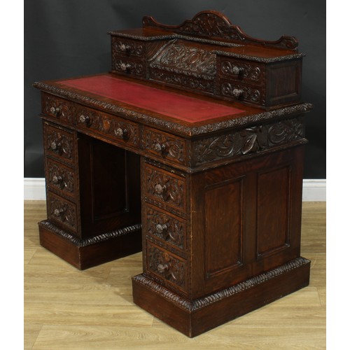 1339 - A late Victorian oak twin pedestal desk, by Edwards & Roberts (fl.1845-1899), stamped, shaped supers... 