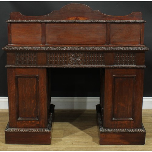 1339 - A late Victorian oak twin pedestal desk, by Edwards & Roberts (fl.1845-1899), stamped, shaped supers... 