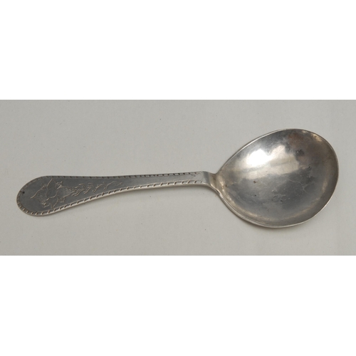 72 - An 18th century Norwegian silver spoon, the handle with bright-cut border, engraved with a flower, m... 