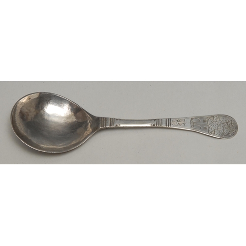 69 - An 18th century Norwegian silver spoon, chamfered stem, the rounded terminal engraved with an archit... 