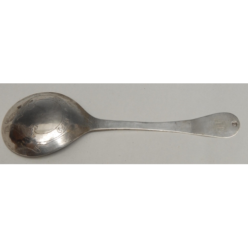 69 - An 18th century Norwegian silver spoon, chamfered stem, the rounded terminal engraved with an archit... 