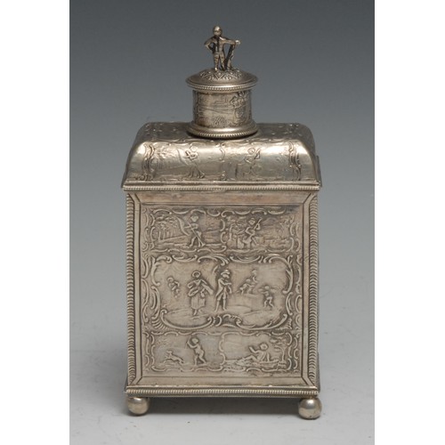 94 - A Dutch silver rectangular tea caddy, profusely chased with busy scenes of putti and courting couple... 