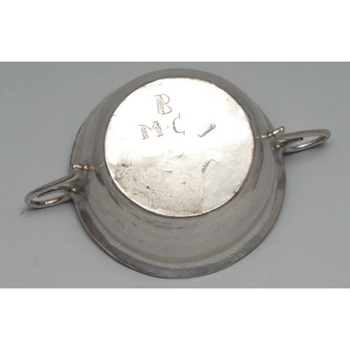 205 - A Queen Anne Britannia silver toy porringer, scroll handles, 7.5cm wide, Lawrence Cole, London 1704