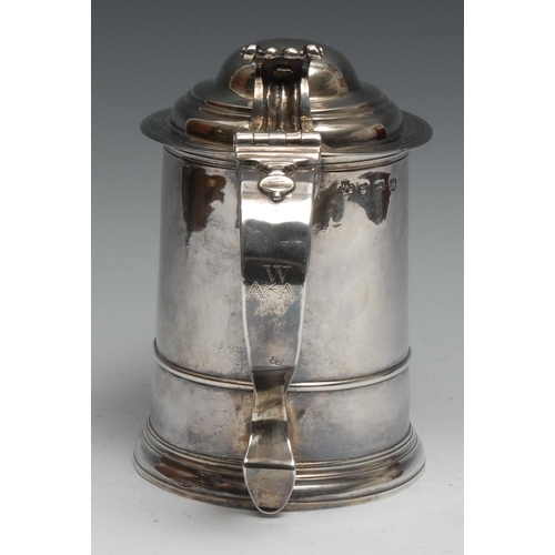 98 - London Livery Companies - a George I silver cylindrical tankard, hinged domed cover with Onslow thum... 