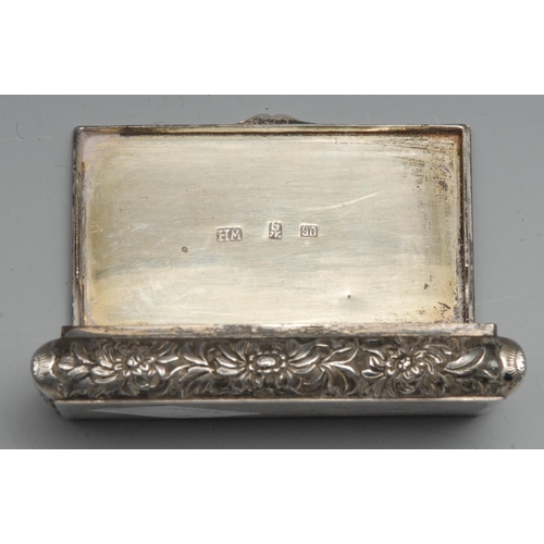 87 - A Chinese silver rectangular snuff box, chased and engraved with figures and the Three Friends of Wi... 