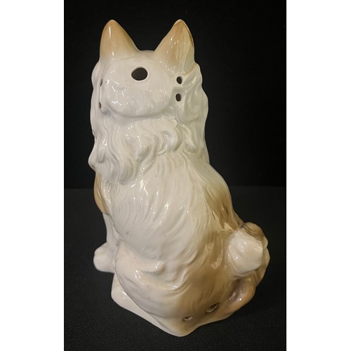 3000 - A German novelty night light, in the form of a Spitz, 16cm high, c.1920